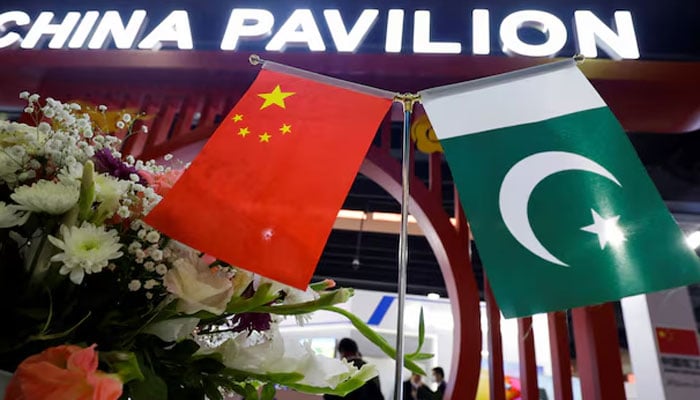 Flags of Pakistan and China are seen at the entrance of the China Pavilion, during the International Defence Exhibition and Seminar IDEAS 2022 in Karachi, Pakistan, November 16, 2022. — Reuters