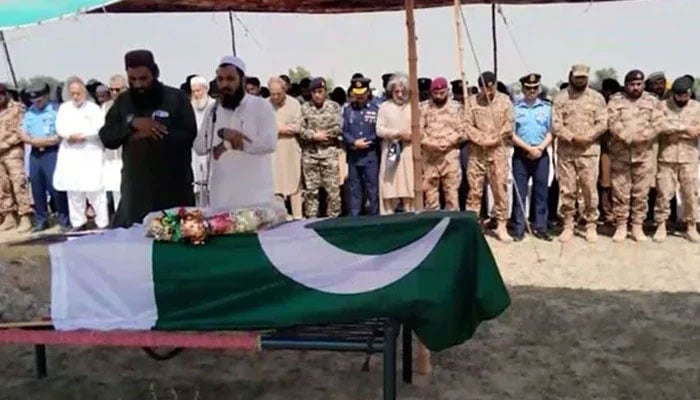 Representational image shows people offering  Namaz-e- Janaza of a martyr . — Radio Pakistan/File