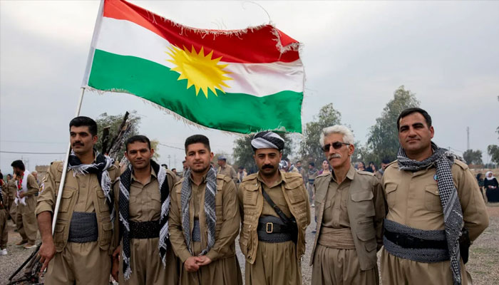 The Democratic Party of Iranian Kurdistan (PDKI) members pose for the camera as they celebrate Nowruz at the Jezhnikan Village around Baharka, Iraq, on March 18, 2025.—AFP