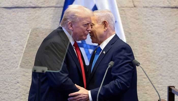US President Donald Trump and Israeli Prime Minister Benjamin Netanyahu stand at the Knesset on the day Trump addresses it, amid a U.S.-brokered prisoner-hostage swap and ceasefire deal between Israel and Hamas, in Jerusalem, October 13, 2025. — Reuters