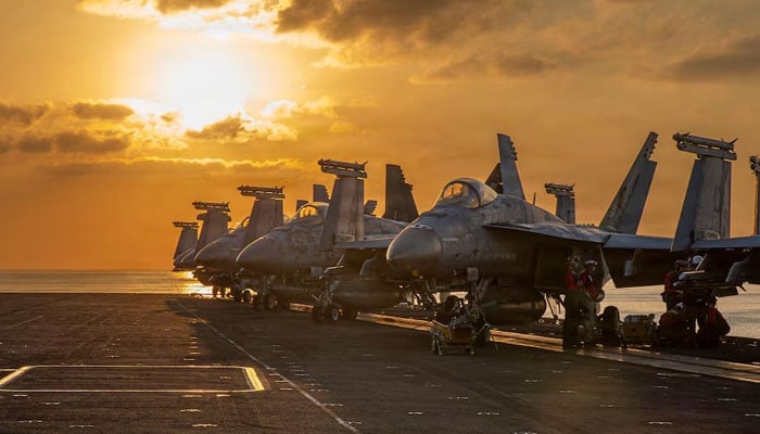 Aircraft are staged for flight operations on the flight deck of the US Navy Nimitz-class aircraft carrier USS Abraham Lincoln in support of the Operation Epic Fury attack on Iran from an undisclosed location, March 3, 2026. — Reuters