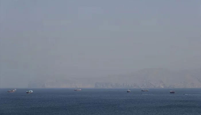 Boats in the Strait of Hormuz amid the US-Israeli conflict with Iran, as seen from Musandam, Oman, March 2, 2026.—Reuters