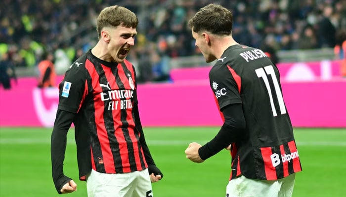 AC Milans Christian Pulisic celebrates scoring their first goal with Alexis Saelemaekers. —Reuters