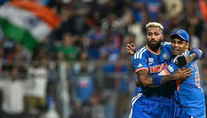 India’s Hardik Pandya (left) celebrates with his captain Suryakumar Yadav after taking the wicket of England’s Phil Salt during the 2026 ICC Men’s T20 Cricket World Cup semi-final match between India and England at the Wankhede Stadium in Mumbai on March 5, 2026. — AFP