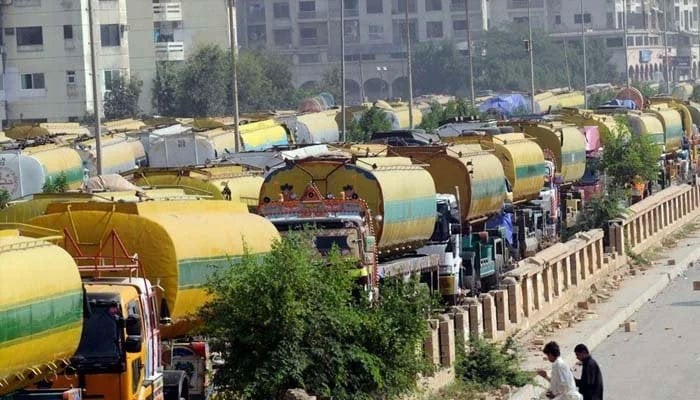 Numerous tankers are seen parked somewhere in Karachi. — APP/File