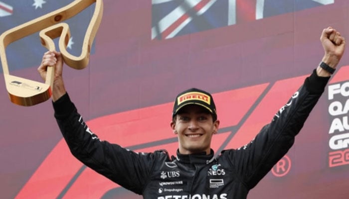 George Russell celebrates an unexpected win in Austria. — AFP/File