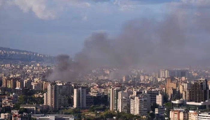 Smoke billows over Beirut, after overnight Israeli air strikes, as seen from Sin El Fil, Lebanon, October 2, 2024.—Reuters
