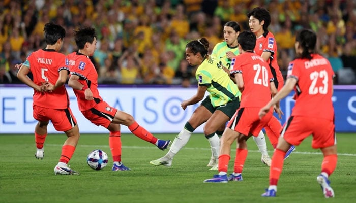 South Korea and  Australia fighting for the ball. —Mancity website/File