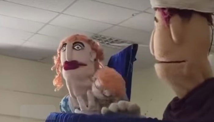 An image from a puppet show. — APP/File