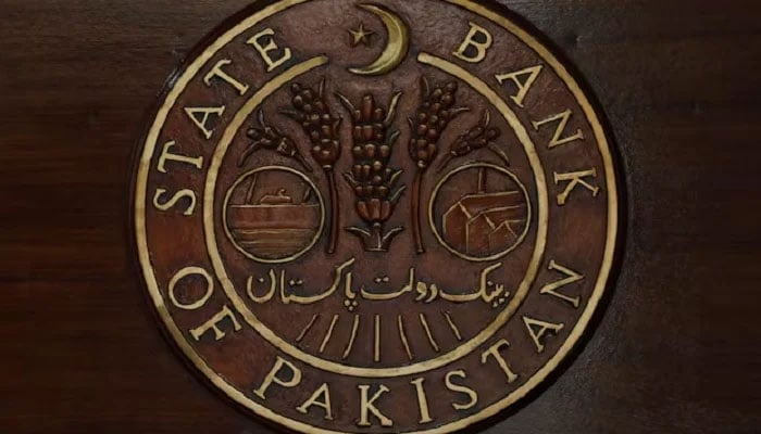 The logo of the State Bank of Pakistan is pictured on a reception desk at the banks head office in Karachi, Pakistan, July 16, 2019.— Reuters