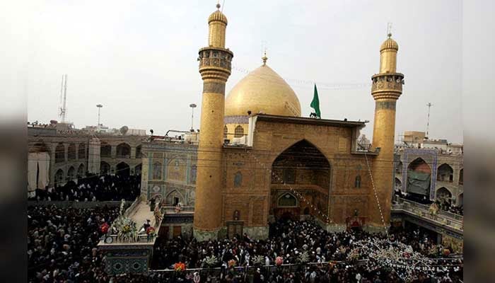 Muslims attend a religious ritual at the Imam Ali a.s shrine in Najaf, 160 km (100 miles) south of Baghdad, December 6, 2009. — Reuters