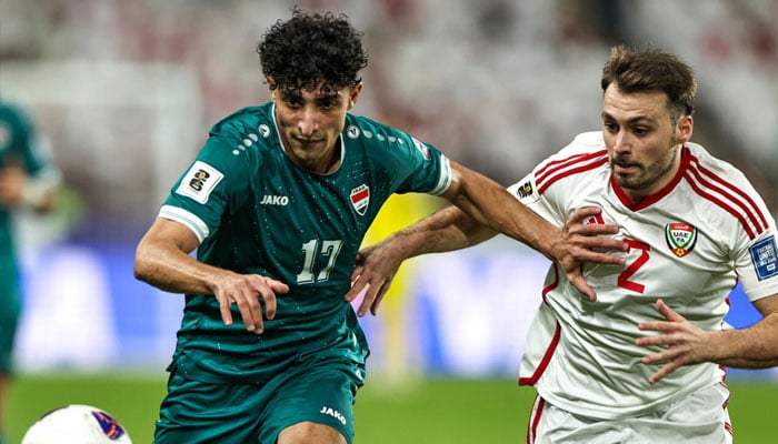 Representational image of an Iraqi player (left) fighting for the ball. —AFP/File