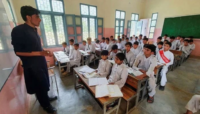 Students attend a class at a school in Khyber Pakhtunkhwa. — Reuters/File