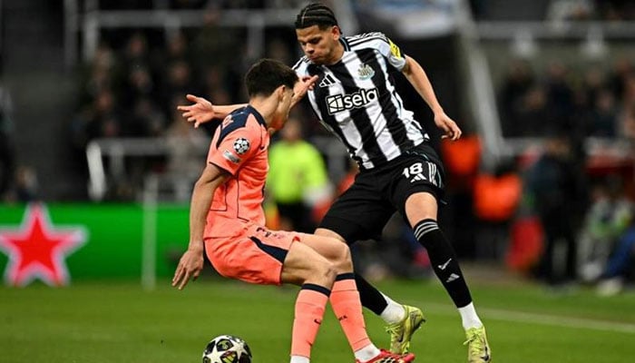Barcelonas Spanish defender Pau Cubarsi battles for the ball with Newcastle Uniteds Danish striker William Osula during the UEFA Champions League, round of 16 football match between Newcastle United and FC Barcelona at St James Park in Newcastle-upon-Tyne, north east England on March 10, 2026. —AFP