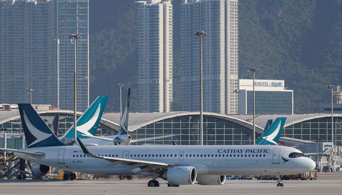 A Cathay Pacific aircraft taxis at Hong Kong International Airport on the day of the official launch of its third runway, in Hong Kong, China, November 28, 2024.—Reuters