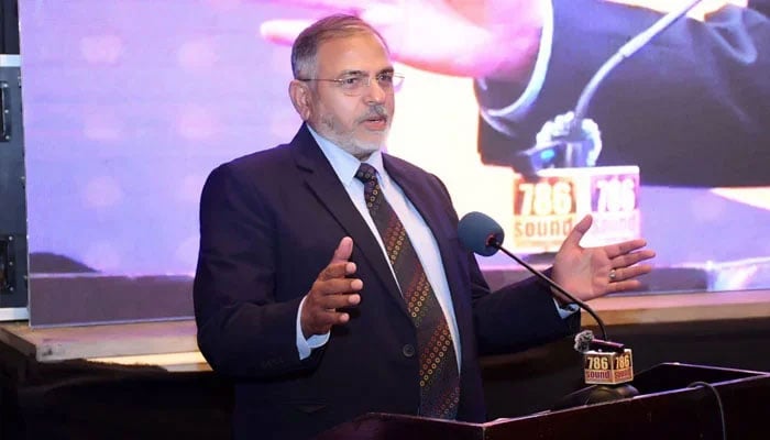 Senior business leader  Dr Mushtaq Mangat addressing the event. —Facebook@akfcp/File