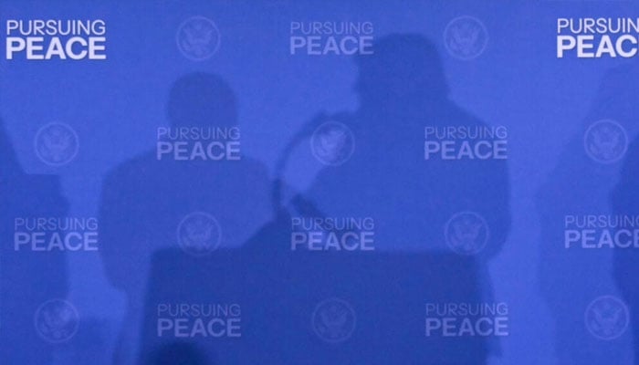 The shadows of US President Donald Trump and Russian President Vladimir Putin seen at their 2025 summit in Anchorage. —AFP/File