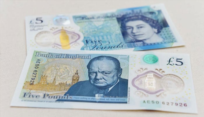 Churchill appears on the current £5 note along with an image of Parliament. —AFP/File