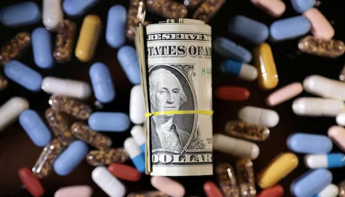 US dollar banknotes and medicines are seen in this illustration taken, June 27, 2024.—Reuters