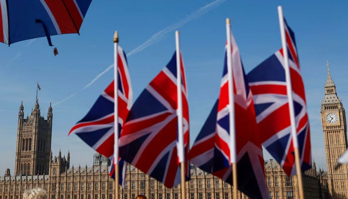 A general view of Union Jack flags and the Houses of Parliament in London, Britain, April 12, 2025. — Reuters