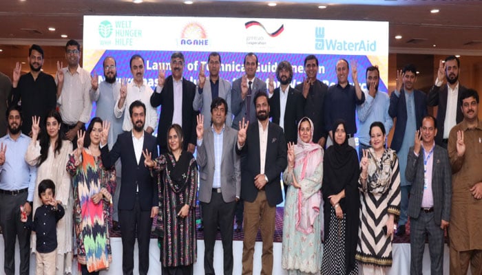 Participants pose for a group photo at a learning exchange organised by WaterAid Pakistan in collaboration with WHH and AGAHE on March 13, 2026. — Facebook@WaterAidPK