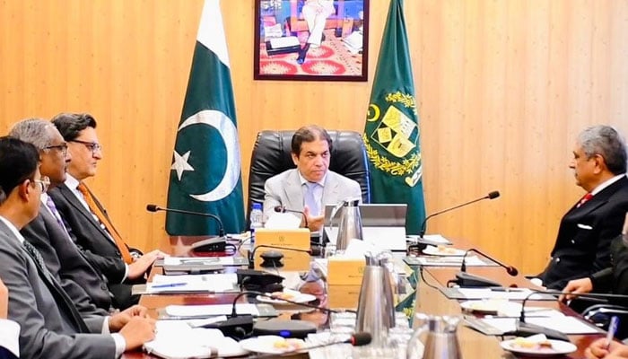 Federal Minister for Railways Muhammad Hanif Abbasi chairs a meeting on January 13, 2026. — Facebook@hanifabbasiNA56