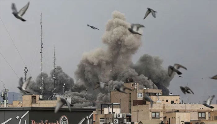 Smoke rises over Tehran on March 2, amid U.S. and Israeli attacks on the Iranian capital. With most of its proxies severely weakened, the Islamic Republic is facing its most perilous moment largely alone. —Reuters