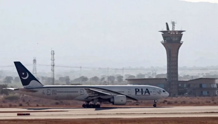 A PIA aircraft prepares to take off at the Islamabad International Airport. — AFP/File