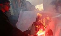 Protesters Burn Photos Of Trump, Meloni In Rome March