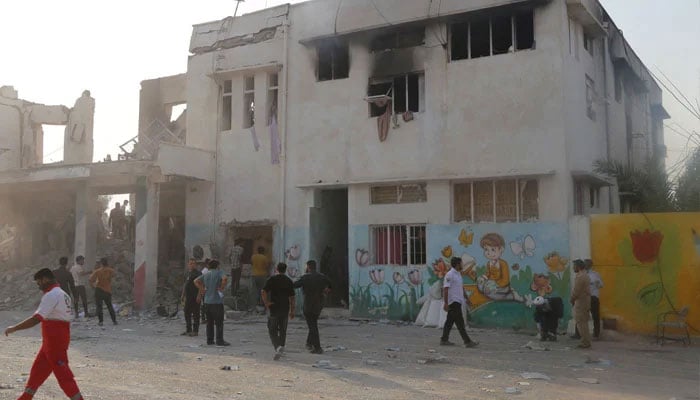 The aftermath of a reported US strike on a school in Minab, Iran, February 28, 2026. — Reuters