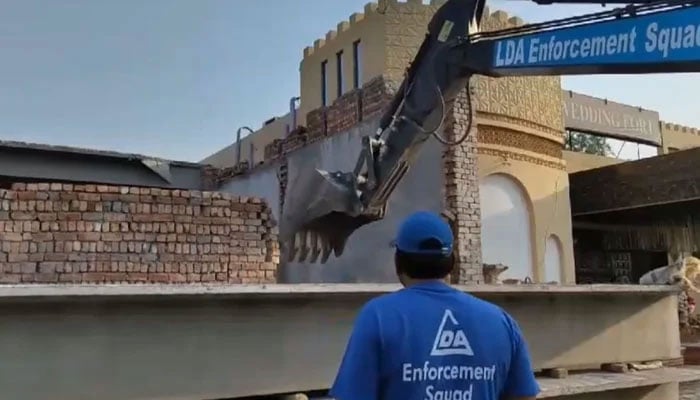 Lahore Development Authority teams conduct a special operation against illegal constructions and commercialisation fee defaulters on June 24, 2024. — Screengrab via Facebook@LahoreDevelopmentAuthority