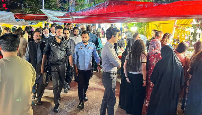 Islamabad Police personnel are seen in a market maintaining order and safety across the capital’s major commercial hubs during the Eid shopping on March 16, 2026. — Facebook@islamabadpolice