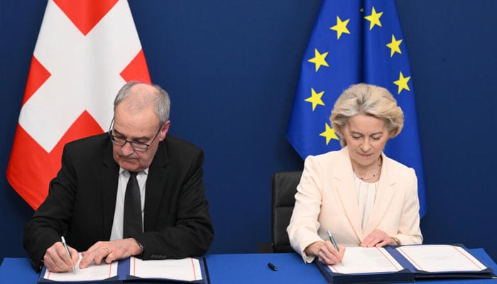 Swiss President Guy Parmelin and the EUs Ursula von der Leyen are inking a package of deals. —AFP/File