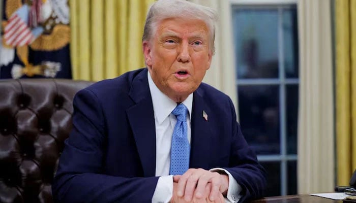 US President Donald Trump looks on as he signs an executive order in the Oval Office at the White House in Washington, US, January 31, 2025. — Reuters