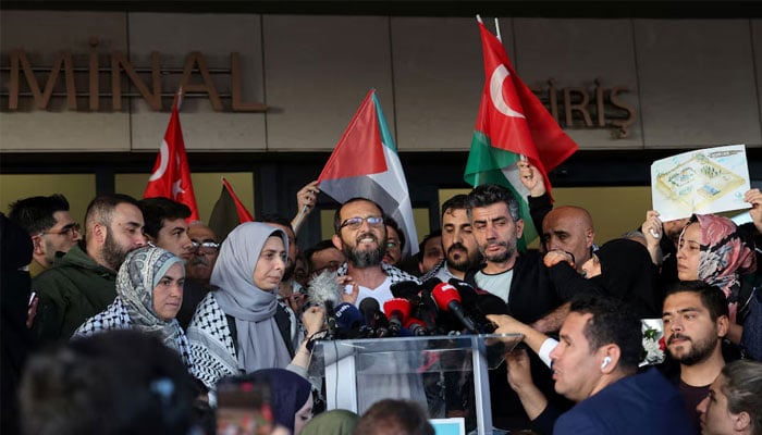 Halil Rifat Canakci of Turkey, one of the activists who were sailing aboard vessels from the Global Sumud Flotilla which were seized by Israeli forces, reacts after arriving at Istanbul Airport on a special flight, in Istanbul, Turkey, October 4, 2025.—Reuters