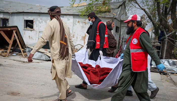 Red Crescent volunteers carry a body of a victim, who died in what the Taliban said was a Pakistani air strike on a drug users rehabilitation hospital, in Kabul, Afghanistan, March 17, 2026.—Reuters