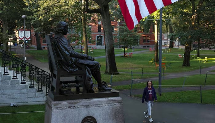 A woman walks on campus at Harvard University in Cambridge, Massachusetts, US, September 4, 2025. — Reuters