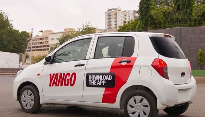 A car with Yango sticker on its door seen in this image. — Instagram@Yango.Pakistan/File