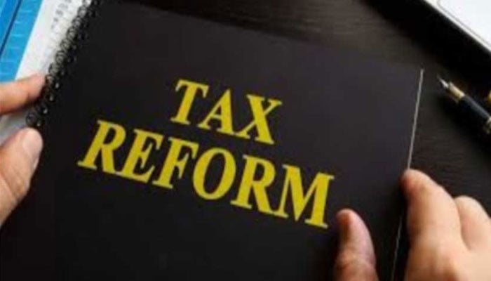 The representational image displays a document labeled TAX REFORM, which typically pertains to significant changes in tax laws and regulations. — The News/File
