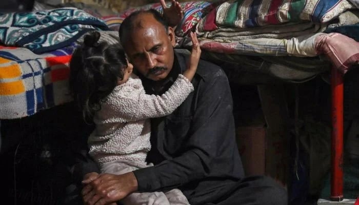 A representational image of a man and a child.— AFP/File