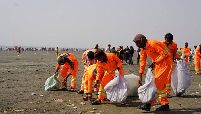 Sindh Solid Waste Management Board (SSWMB) workers are collecting garbage in the city. — Facebook@sswmbo/File