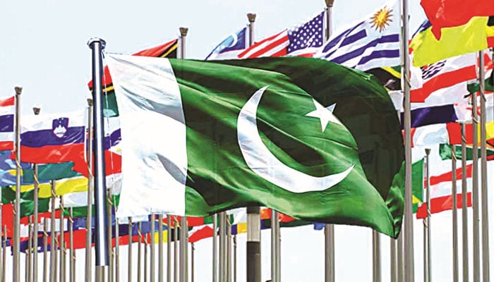 This image shows Pakistans flag surrounded by flags from various other nations. — The News/File