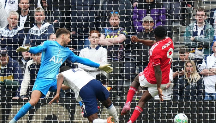 Taiwo Awoniyi (right) scores to clinch a 3-0 win for Nottingham Forest at Tottenham Hotspur. — AFP