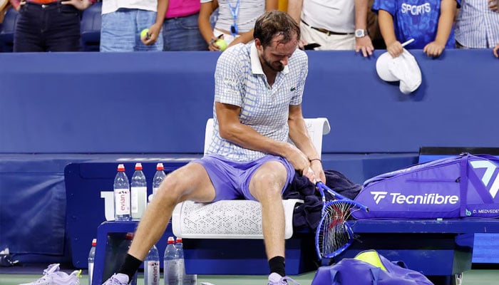 Russias Daniil Medvedev breaks his racquet after his first round match against Frances Benjamin Bonzi. —Reuters