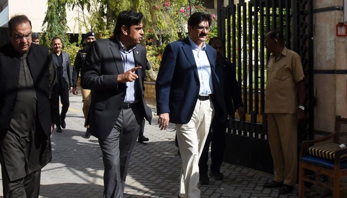 Sindh Chief Minister Syed Murad Ali Shah, accompanied by Chief Secretary Asif Hyder Shah, leaves the new Secretariat to visit Tughlaq House, commonly known as the Old Secretariat, on March 24, 2026. —Facebook@SindhCMHouse