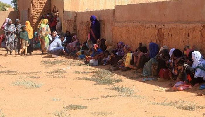 Displaced people from the towns of Bara and Umm Dam Haj Ahmed in North Kordofan State take shelter in Omdurman, part of greater Khartoum, on November 10, 2025. —AFP