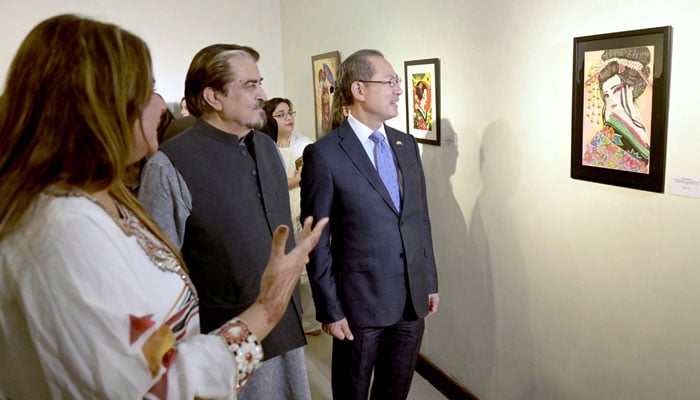 Ambassador of Japan to Pakistan, Akamatsu Shuichi and acclaimed artist Jamal Shah, President of PJCA Islamabad, visit the exhibition at PNCA on March 25, 2026. — APP