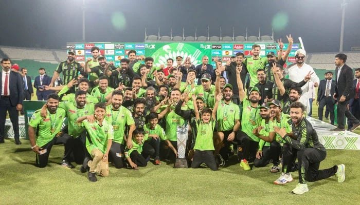Lahore Qalandars players and support staff celebrate winning PSL 10 after beating Quetta Gladiators in the final at Gaddafi Stadium in Lahore on May 25, 2025. — PSL