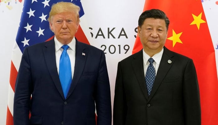 US President Donald Trump and Chinas President Xi Jinping pose for a photo ahead of their bilateral meeting during the G20 leaders summit in Osaka, Japan, June 29, 2019. — Reuters