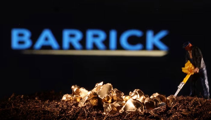 A small toy figure and gold imitation are seen in front of the Barrick logo in this illustration taken November 19, 2021.—Reuters
